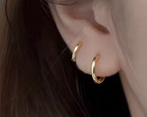 女性のためのセクシーならせん14KゴールドフープピアスODM 1.2ミリメートル×10ミリメートル寸法